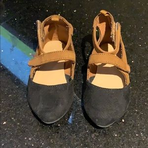 Black and brown suede shoes